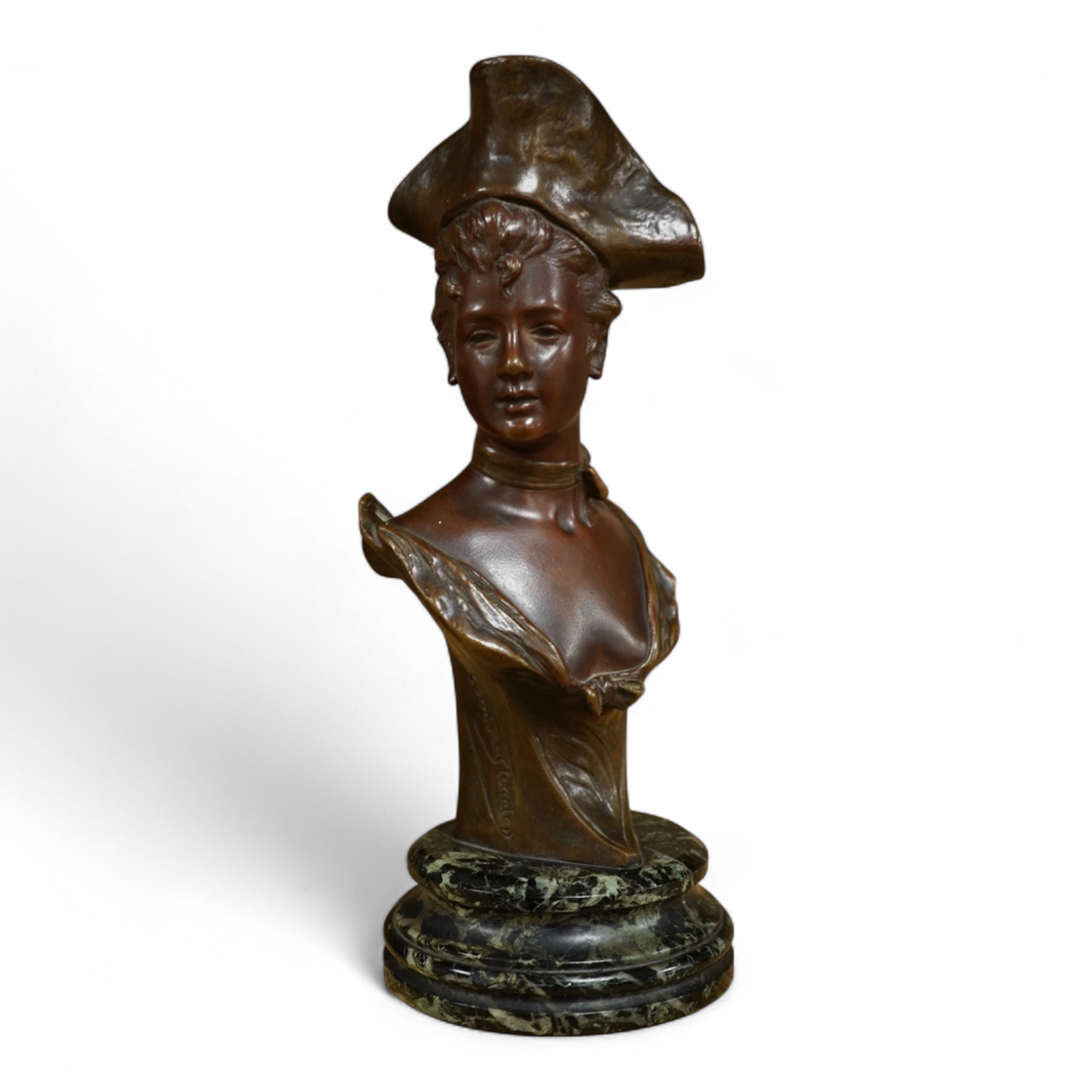 George Van Der Straeten (Belgium, 1856-1928) A bronze bust of a lady wearing a hat, signed, mounted on marble base, 21.5cm high